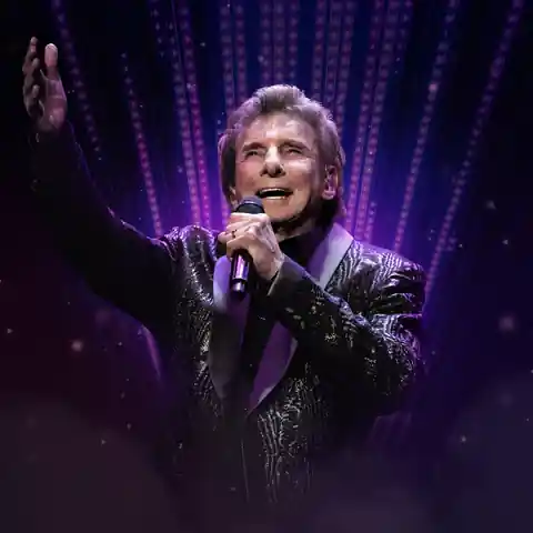 Barry Manilow singing onstage at Westgate Las Vegas