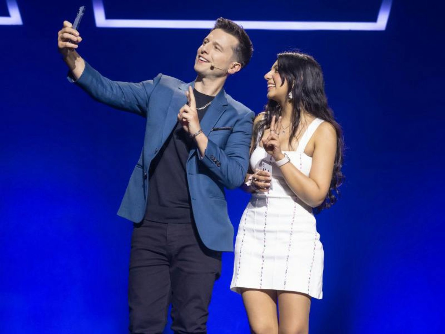 Mat Franco taking an onstage selfie during his Las Vegas show at The LINQ