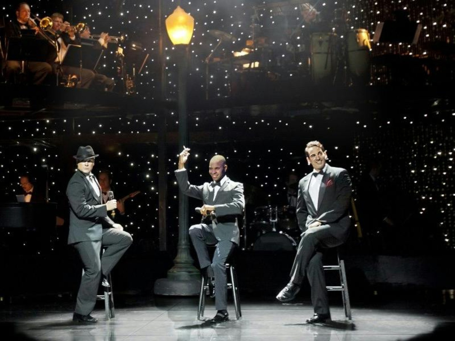 VEGAS! The Show singing trio onstage at Saxe Theater Las Vegas